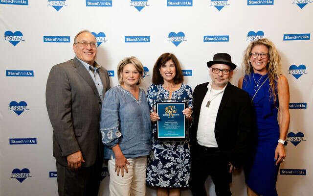 Julie Paris , SWU Mid-Atlanitc regional director (right) with the Chronicle staff, from left: Jim Busis, Amy Weiss, Toby Tabachnick and David Rullo (Adam Reinherz not pictured) (Photo by Christina Montemurro Photography)